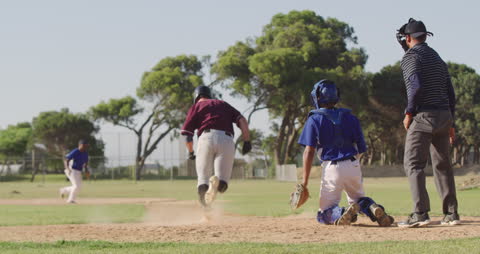 Baseball Player Running to Base After Hit