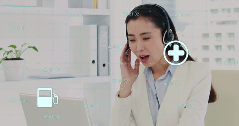 Asian Female Doctor Using Laptop with Global Medical Data Overlay