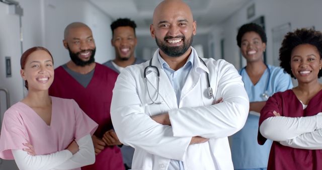 Confident Healthcare Team Standing in Hospital Corridor - Download Free Stock Images Pikwizard.com