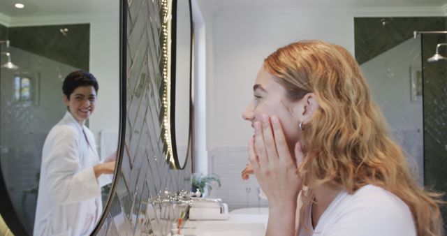 Two Women in Modern Bathroom Having Morning Routine with Smiles - Download Free Stock Images Pikwizard.com