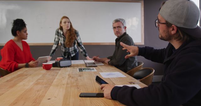 Diverse Team Collaborating in Modern Meeting Room - Download Free Stock Images Pikwizard.com