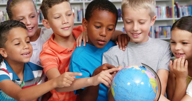 Diverse Children Pointing at Globe Learning About Geography - Download Free Stock Images Pikwizard.com