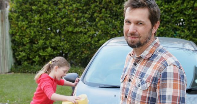 Father and Daughter Washing Car Outdoors in Garden - Download Free Stock Images Pikwizard.com