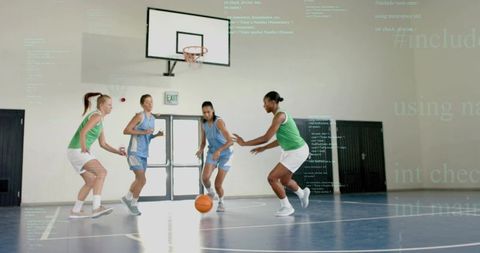 Dribbling player in light-blue jersey facing green-jersey defense near hoop