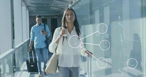 Travelers Walking Through Jet Bridge with Luggage and Coffee