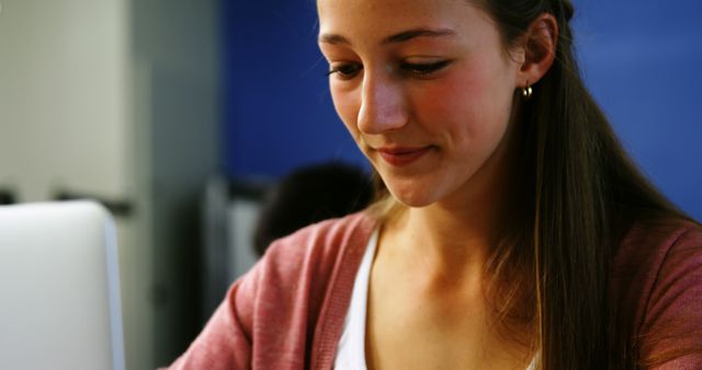 Smiling Woman Working on Computer in Office - Download Free Stock Images Pikwizard.com