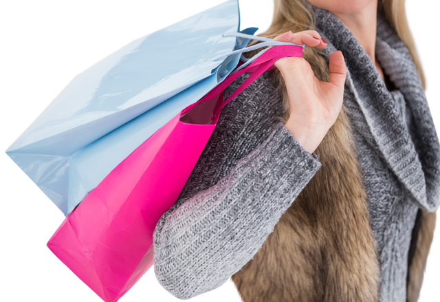 Transparent blonde woman in winter clothes holding shopping bags - Download Free Stock Videos Pikwizard.com