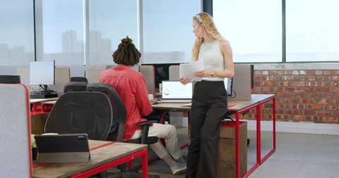 Colleagues Collaboration in Modern Office Setting