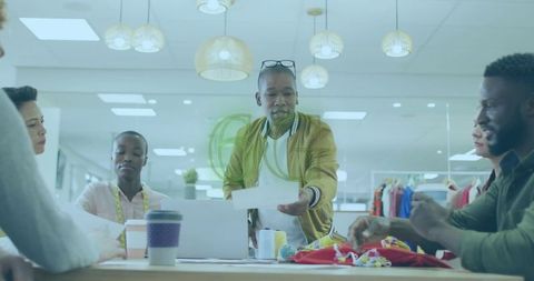 Diverse design team collaborating in fashion studio