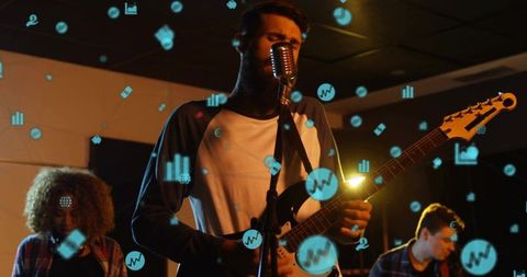 Bearded singer playing electric guitar at vintage mic with floating digital music icons