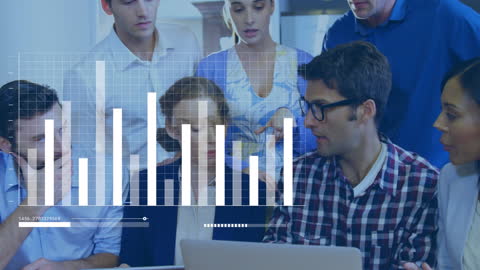 Business Team Analyzing Data Visualizations in Workspace