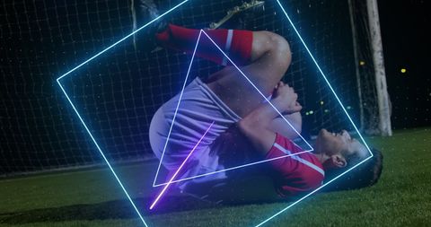 Soccer Player Fallen on Field Colored by Neon Triangle Lights