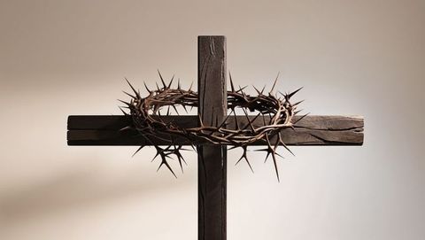 Wooden cross with crown of thorns symbolizing jesus' sacrifice and reverence