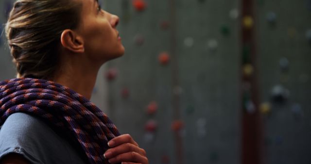 Female Rock Climber Contemplating Climbing Route - Download Free Stock Images Pikwizard.com