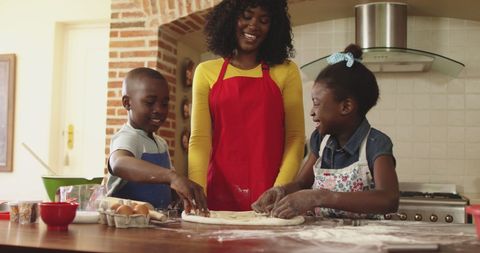 Happy Family Baking Together in Home Kitchen