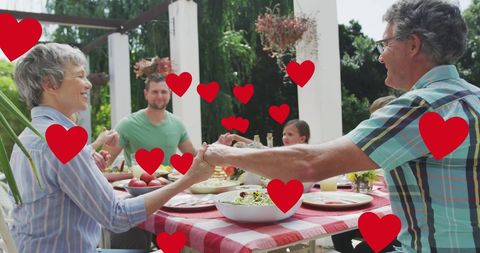Joyful Family Celebrating Meal Outdoors with Love - Download Free Stock Images Pikwizard.com