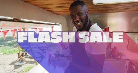 Smiling Vendor Advertising Flash Sale at Bright Outdoor Event