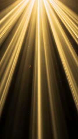 Vertical cinematic golden light beams radiating through dark void with floating dust particles