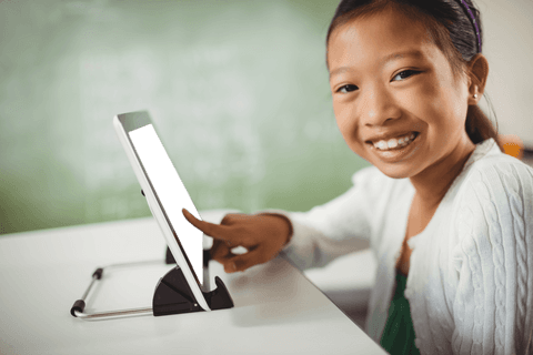 smiling girl using tablet with transparent screen for learning - Download Free Stock Videos Pikwizard.com