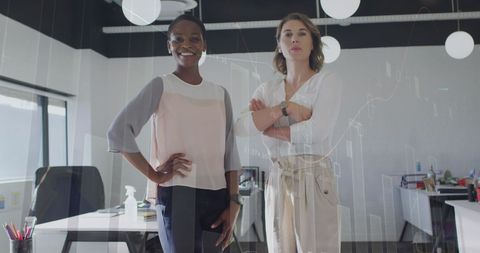 Diverse Business Professionals Overlaid with Financial Charts