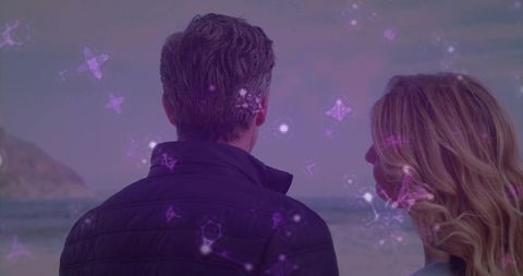 Couple Embracing Starry Sky by Ocean on Tranquil Coastal Evening