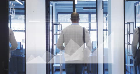 Businessman Walking Through Office with Imposed Graph Data