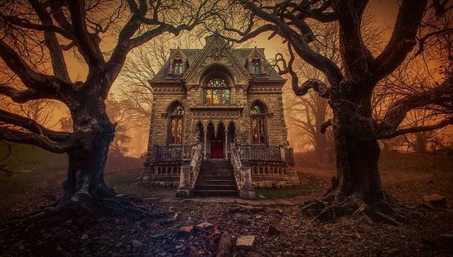 Gothic medieval chapel with stained glass in eerie forest