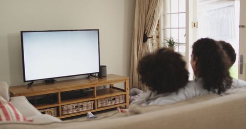 Family Enjoying Quality Time Watching Television - Download Free Stock Images Pikwizard.com