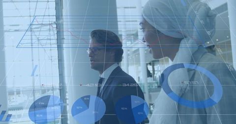 Diverse Businesspeople Analyzing Digital Financial Data Overlay