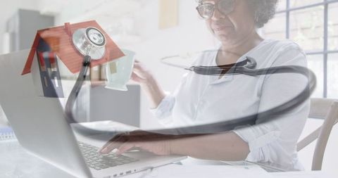 Senior woman remote healthcare concept with stethoscope and home
