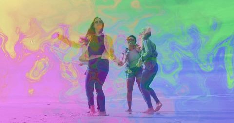 Joyful Friends Running on Colorful Sunset Beach