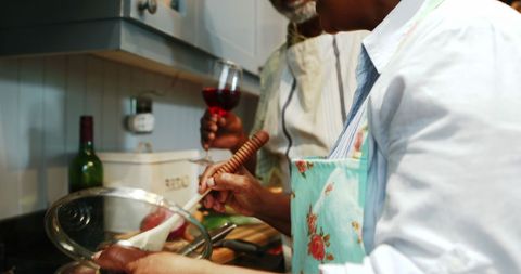 Senior Couple Cooking Together in Cozy Home Kitchen