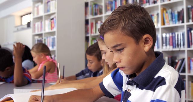 Young Children Studying Diligently in Library - Download Free Stock Images Pikwizard.com