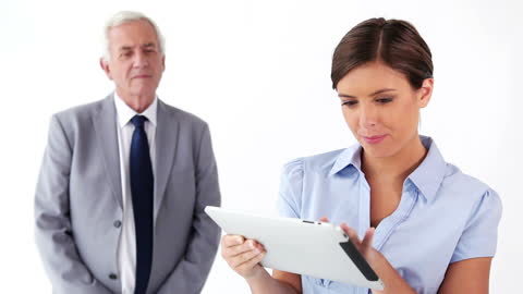 Confident Professional Engaging with Digital Tablet in Office