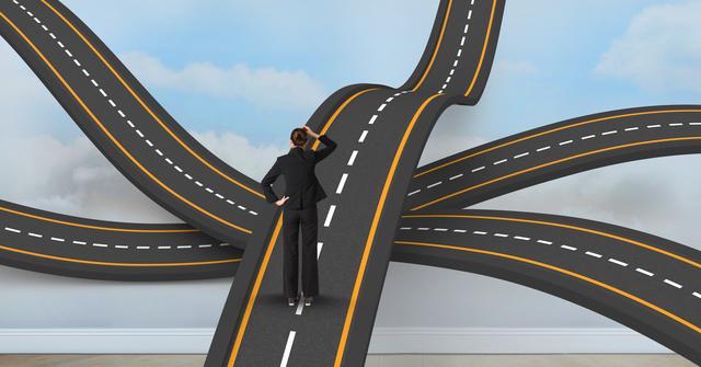 Businesswoman standing on wavy roads against sky, representing decision making and career choices. Ideal for illustrating concepts of professional challenges, uncertainty, and navigating career paths. Useful for business presentations, motivational materials, and articles on career development.