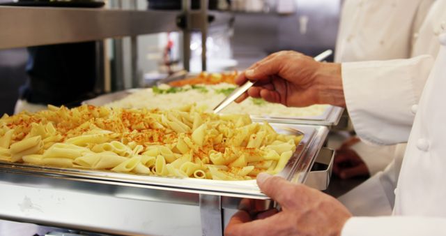 Chef Preparing Pasta in a Restaurant Kitchen - Download Free Stock Images Pikwizard.com