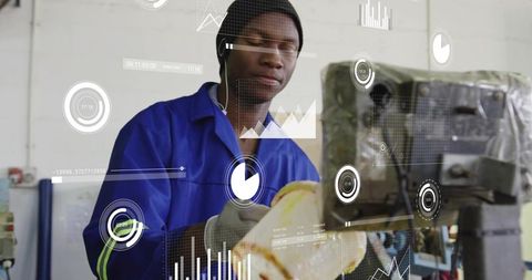 Technician inspecting metal part using augmented reality analytics on industrial machine