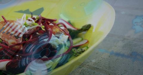 Vibrant beet spiral salad with grilled salmon, asparagus and feta with ar overlay