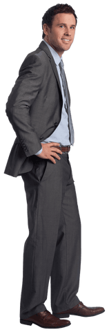 Smiling Confident Businessman with Hands on Hips in Suit on Transparent Background
