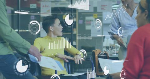 professionals engage in a discussion, surrounded by digital data charts and graphs, highlighting innovation and teamwork in a modern inclusive workspace. useful for illustrating concepts of digital transformation, diverse workforce environments, and integration of virtual data processing in business settings.