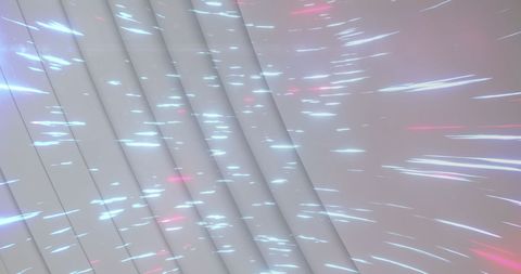 Futuristic Light Trails Across White Curved Surface