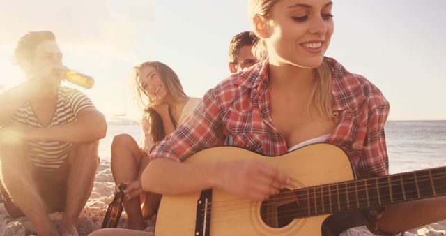 Friends Enjoying Beach Sunset with Guitar and Drinks - Download Free Stock Images Pikwizard.com