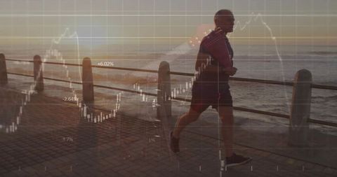 Senior man jogging on seaside promenade at sunset with financial chart overlay