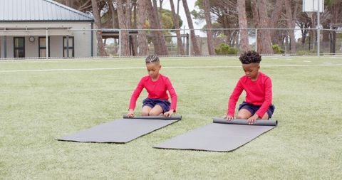 Kids Unrolling Exercise Mats for Outdoor Fitness Activity