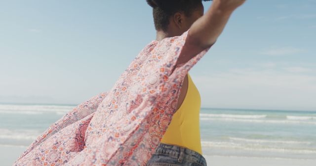 Joyful Woman with Flowing Shawl Enjoying Beach Moment - Download Free Stock Images Pikwizard.com