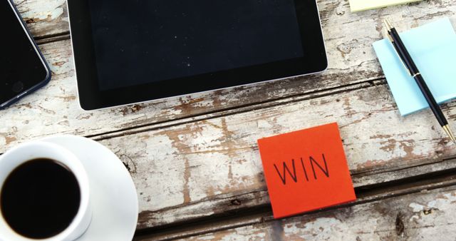 Winning Concept Symbolized on Rustic Workspace with Coffee and Tablet - Download Free Stock Images Pikwizard.com