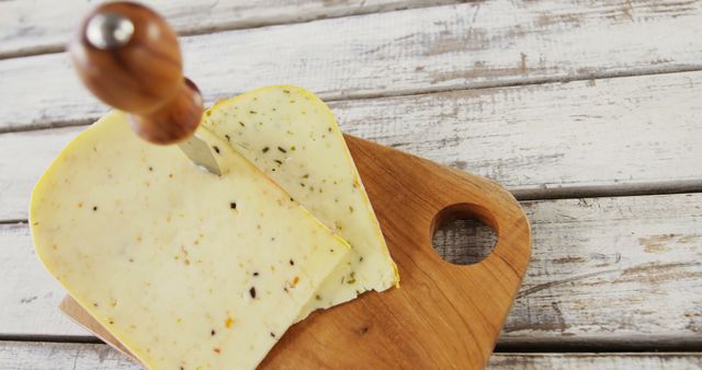 Sliced Pepper Jack Cheese on Wooden Cutting Board - Download Free Stock Images Pikwizard.com