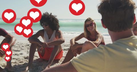 Friends enjoying beach with social media heart icons overlay