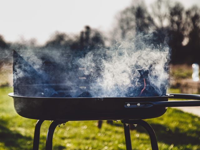 Smoking Barbecue Grill in Outdoor Setting - Download Free Stock Photos Pikwizard.com