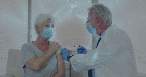 Senior Patient Receiving Vaccine from Healthcare Professional